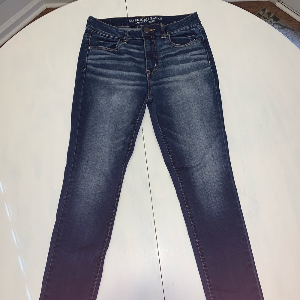 Dark denim jeans.